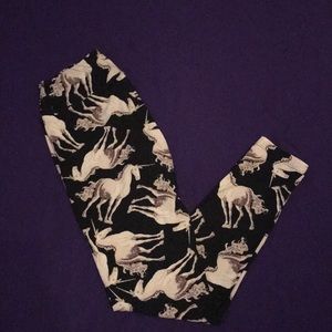 LuLaRoe OS unicorn black background